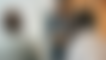 A woman presents her thoughts to colleagues.