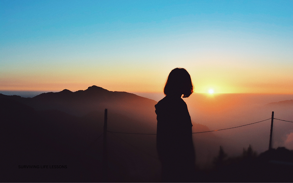 Woman looking toward sunrise over mountains, symbolizing new perspective and hope