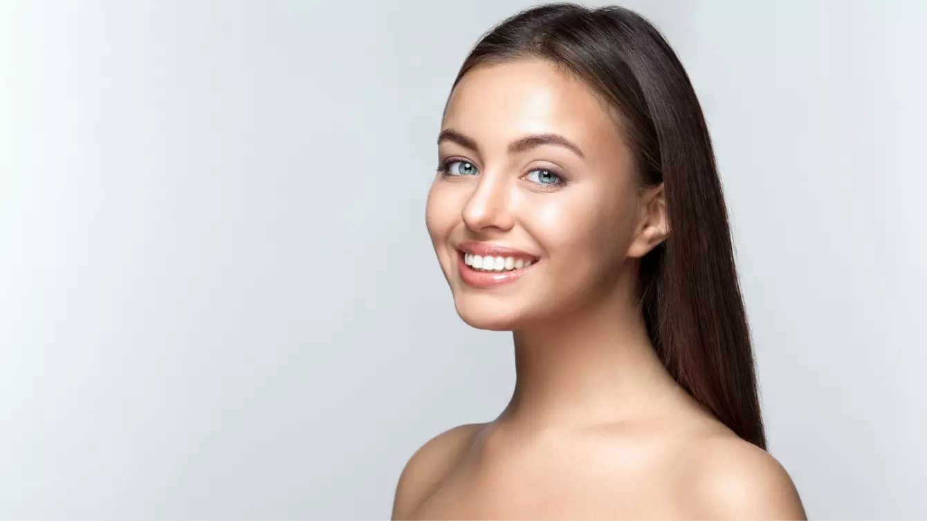 Beautiful Smiling Girl white teeth.webp