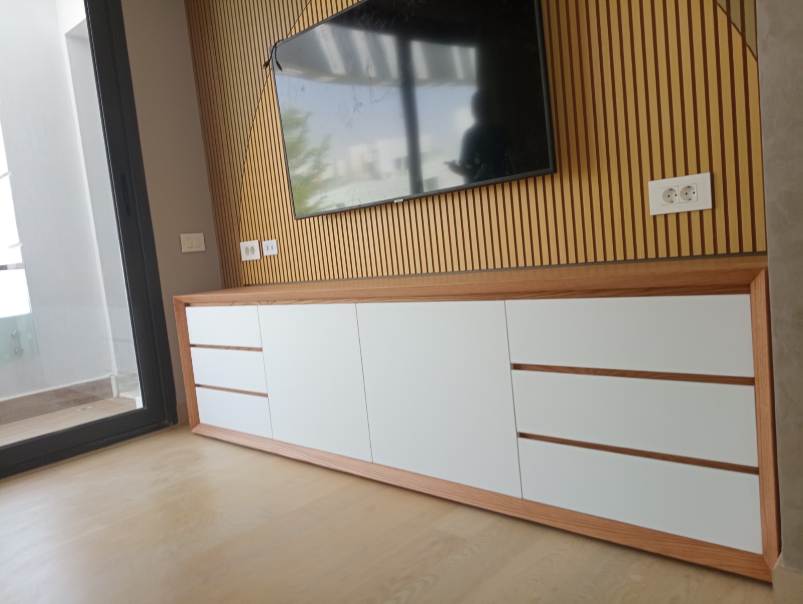 Sleek white TV unit — 1