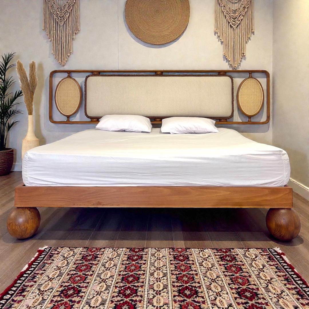 Kamar bed hand carved — Bed platform: Massive Beech wood — Headboard: Natural blockboard + Massive Beech "Hand carved Oyma" + Indonesian Rattan
