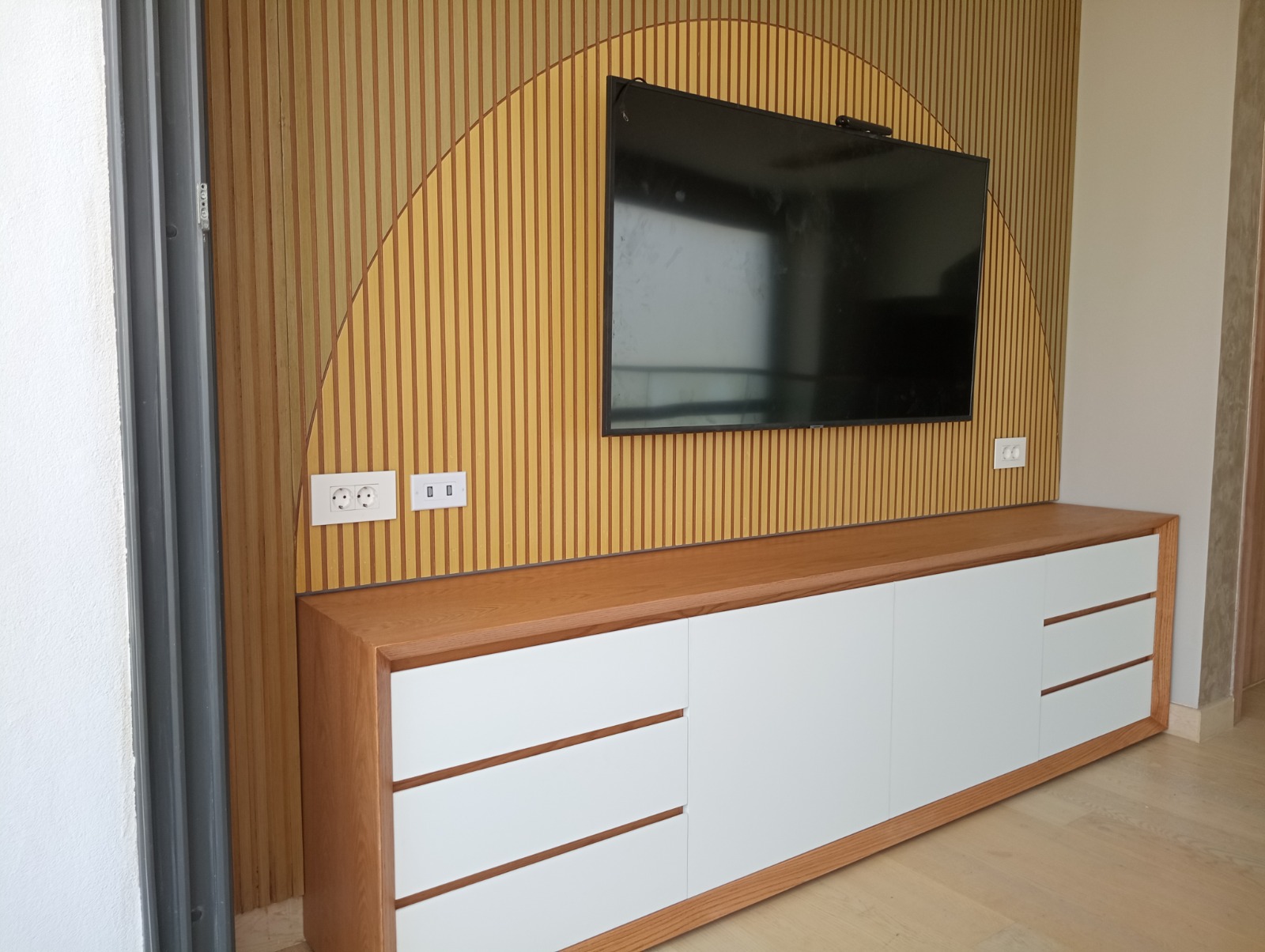 Sleek white TV unit — 3