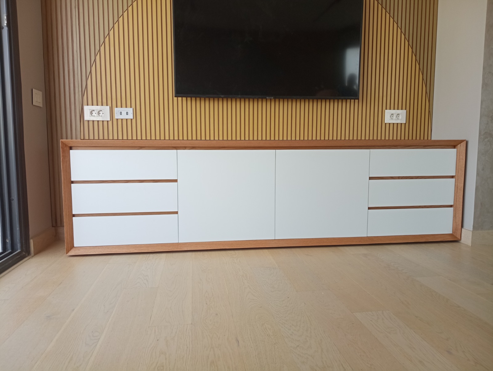 Sleek white TV unit — 2