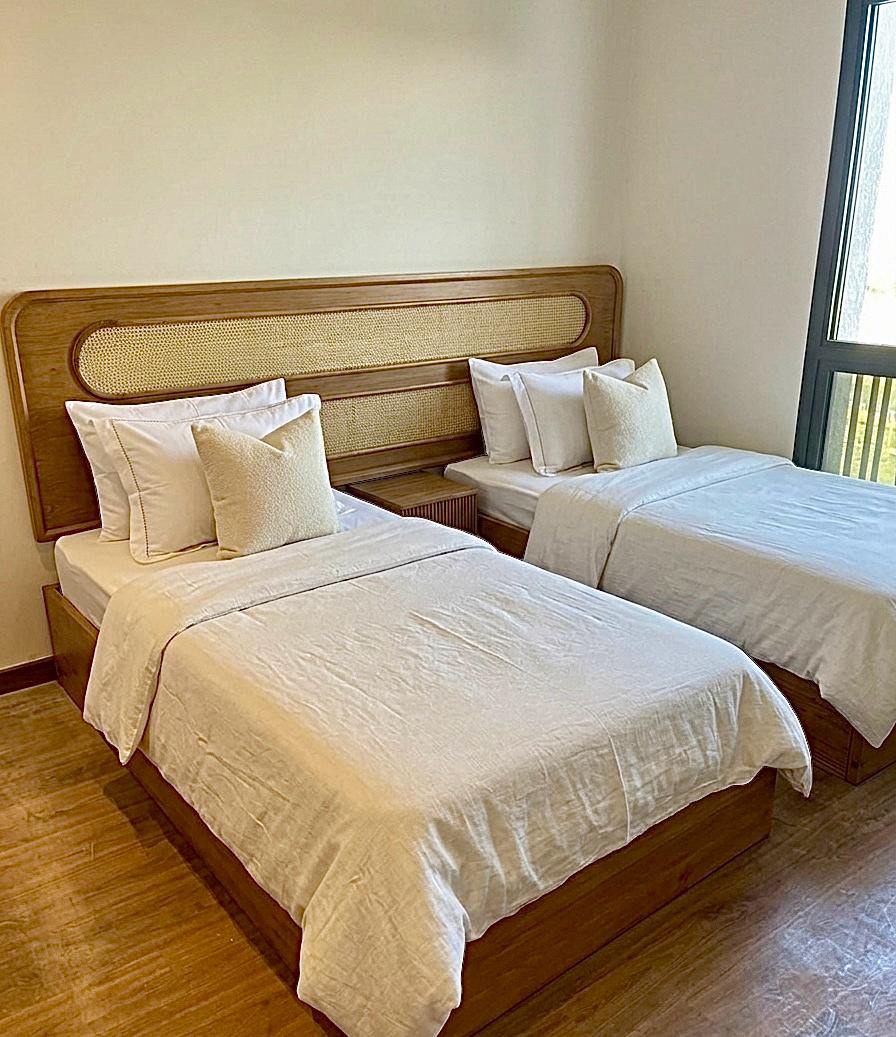 Wabi Twin beds — Bed platform: Massive Beech wood — Headboard: Massive Beech + Natural Indonesian rattan