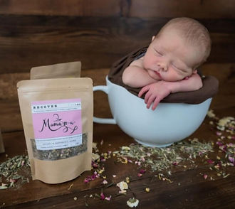 Baby in a teacup with Recover Herbal Tea