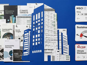 Flat lay mixed-media paper collage on a bright blue background featuring a blue corporate building cut-out layered over sustainability reports, juxtaposed with evaluation cards for MSCI, Sustainalytics, and CDP.