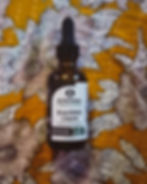 EnerDMG Liquid Bottle with Kantha Bae blanket.