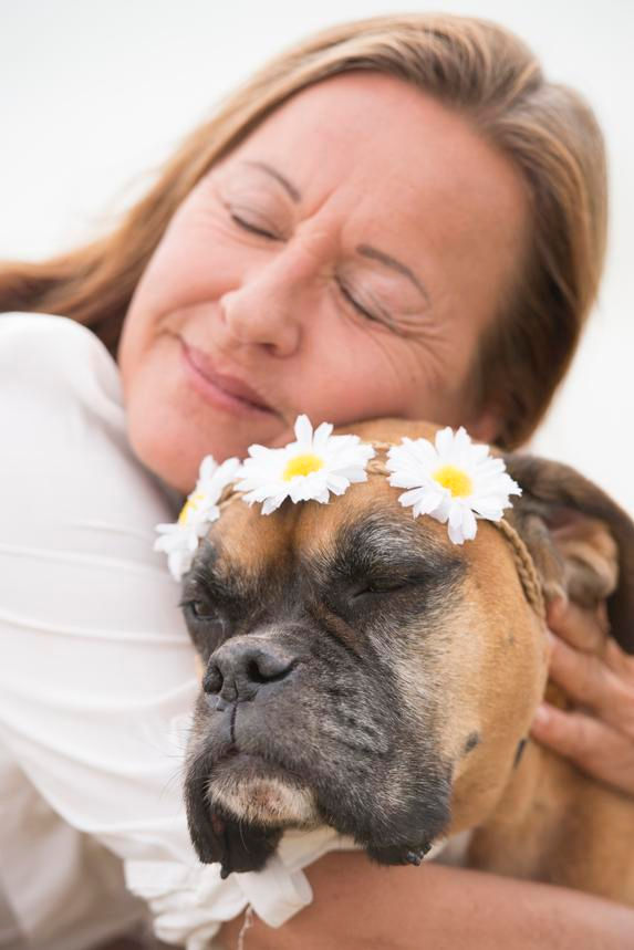 Boxer dog and owner totally bonded