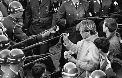 Flower Power- This image taken during the March on the Pentagon became an enduring image of the counterculture.