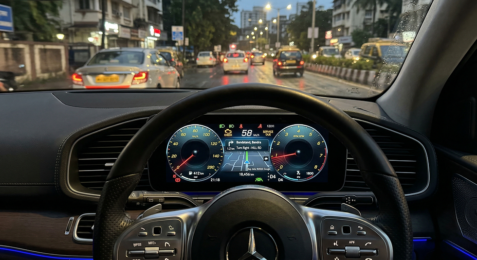 Dashboard warning lights indicating a need for luxury car diagnostics.