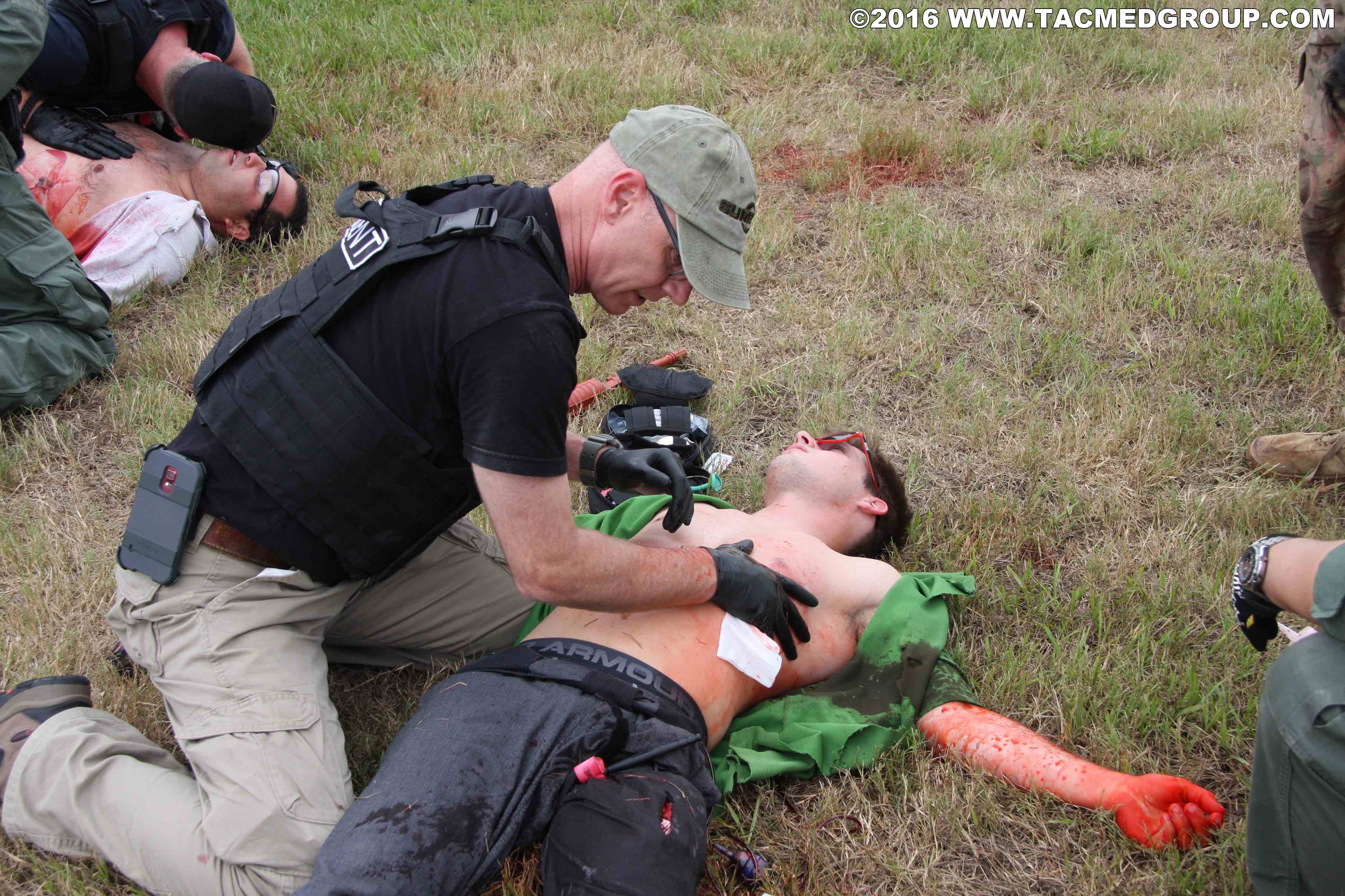 TCCC student putting on chest wound