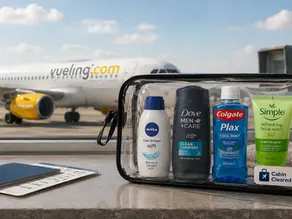 Vueling cabin toiletries rules hero image showing a clear travel toiletries bag with cabin-approved toiletries in front of a Vueling aircraft at the airport.