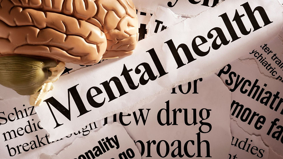 a paper cut-out with "mental health" text