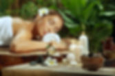 Woman Relaxing in Serene Massage Spa