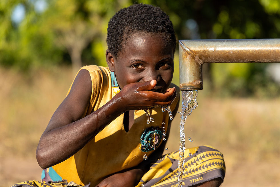Mary at community borehole