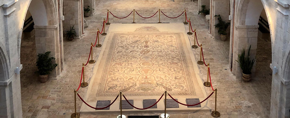 The floor mosaic, with birds and clusters of grapes, in the courtyard of Jerusalem's Edward and Helen Mardigian Armenian Museum