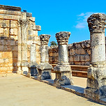 Stone column ruins in Capernaum, Israel, on a suny day