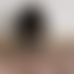 art exhibit of broken looking plates on the floor