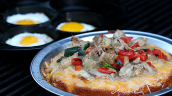 Charred Peppers Chile Verde over Cheesy Cornbread with Fried Eggs
