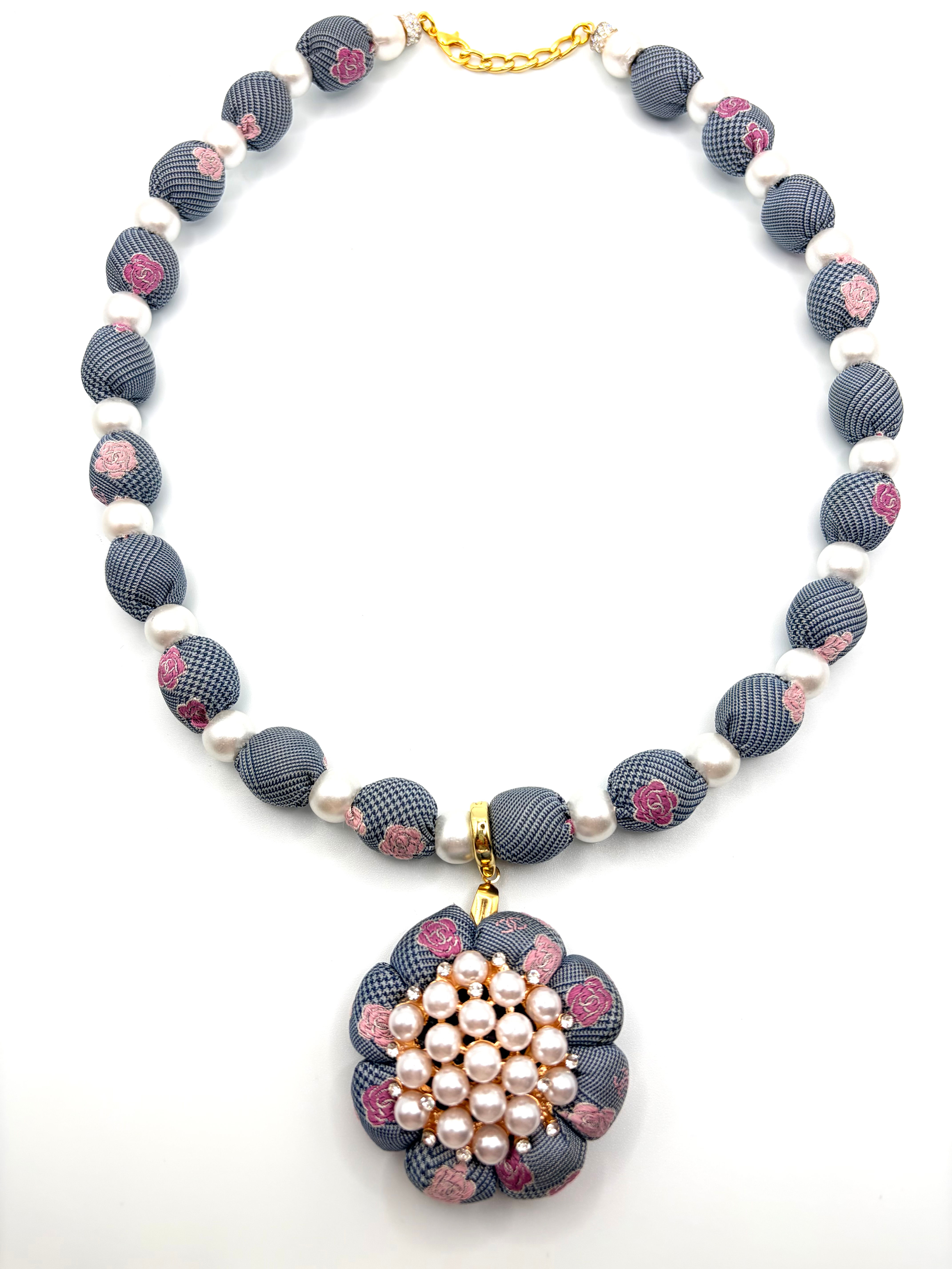 Navy houndstooth pink camellia logo necklace made from a vintage Chanel silk tie