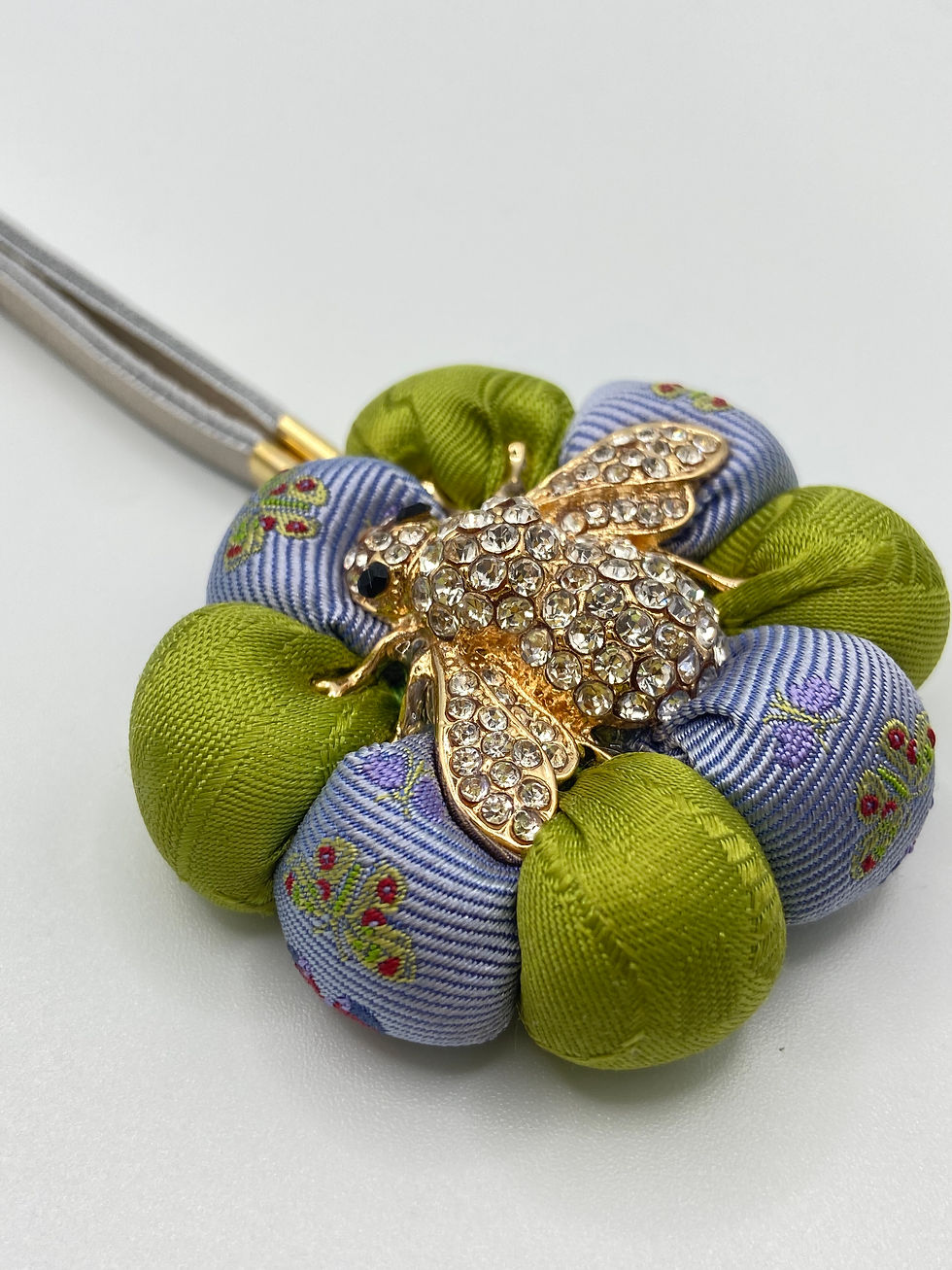 Thumbnail: Lime & blue bee bag charm made from vintage Gucci silk ties