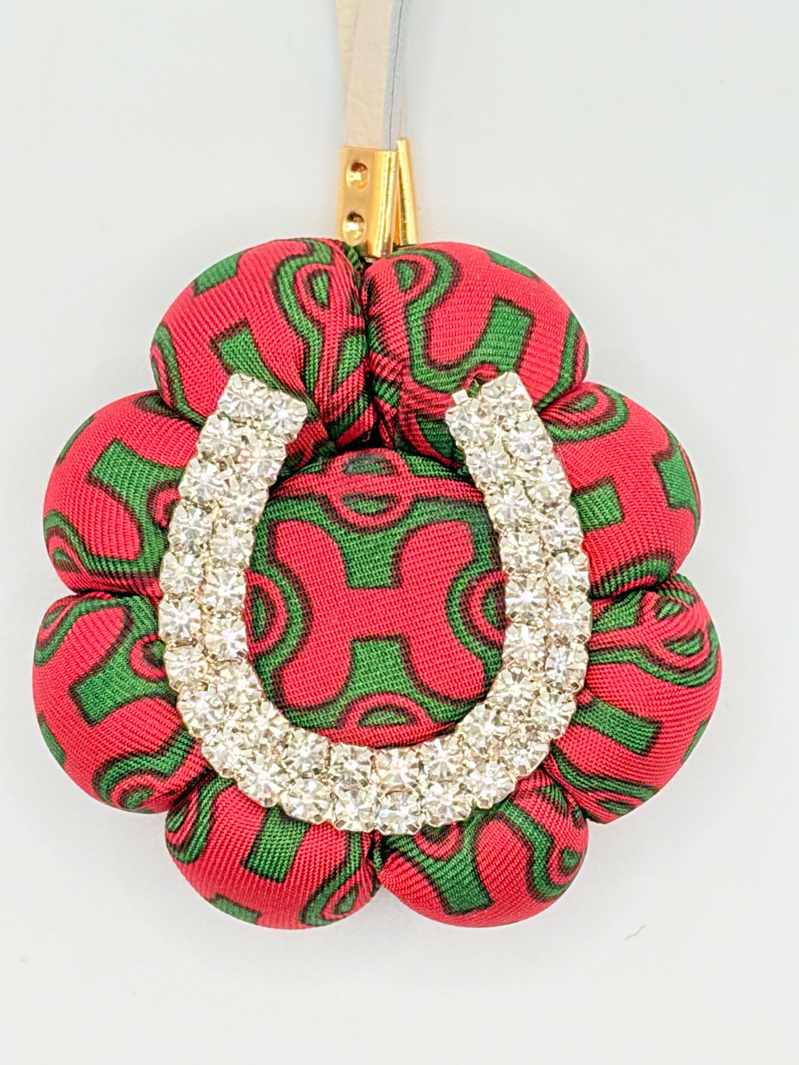 Red & green H print horseshoe bag charm made from a vintage Hermes silk tie