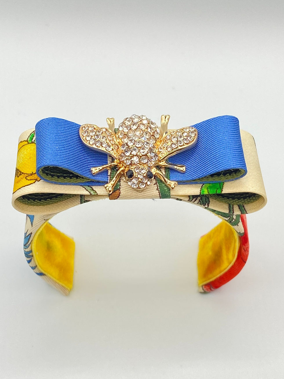 Thumbnail: Cream and blue botanical print cuff made from a vintage Gucci Flora silk tie