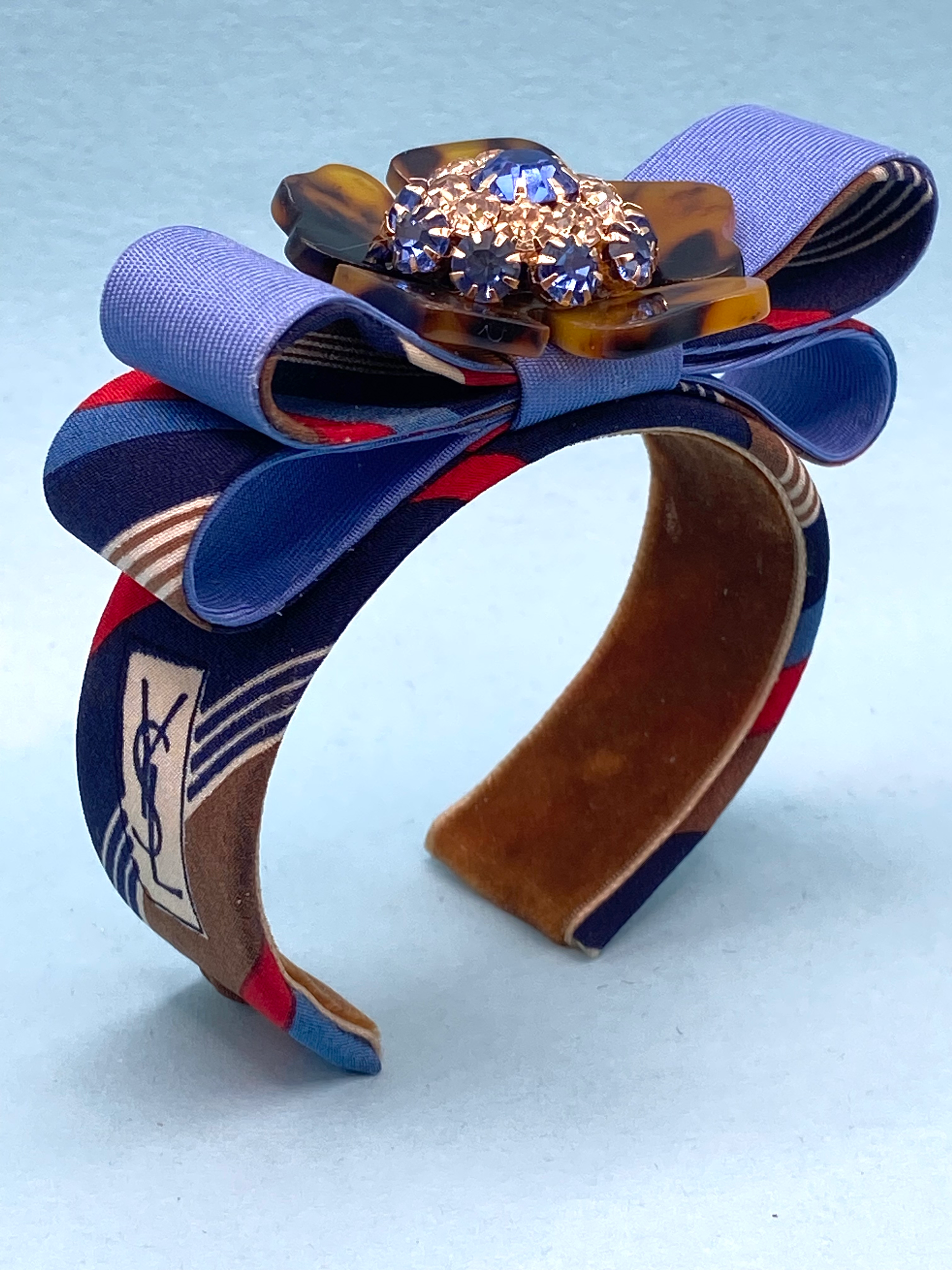 Blue, tan & red stripe YSL logo cuff & blue bow made from a vintage silk YSL tie