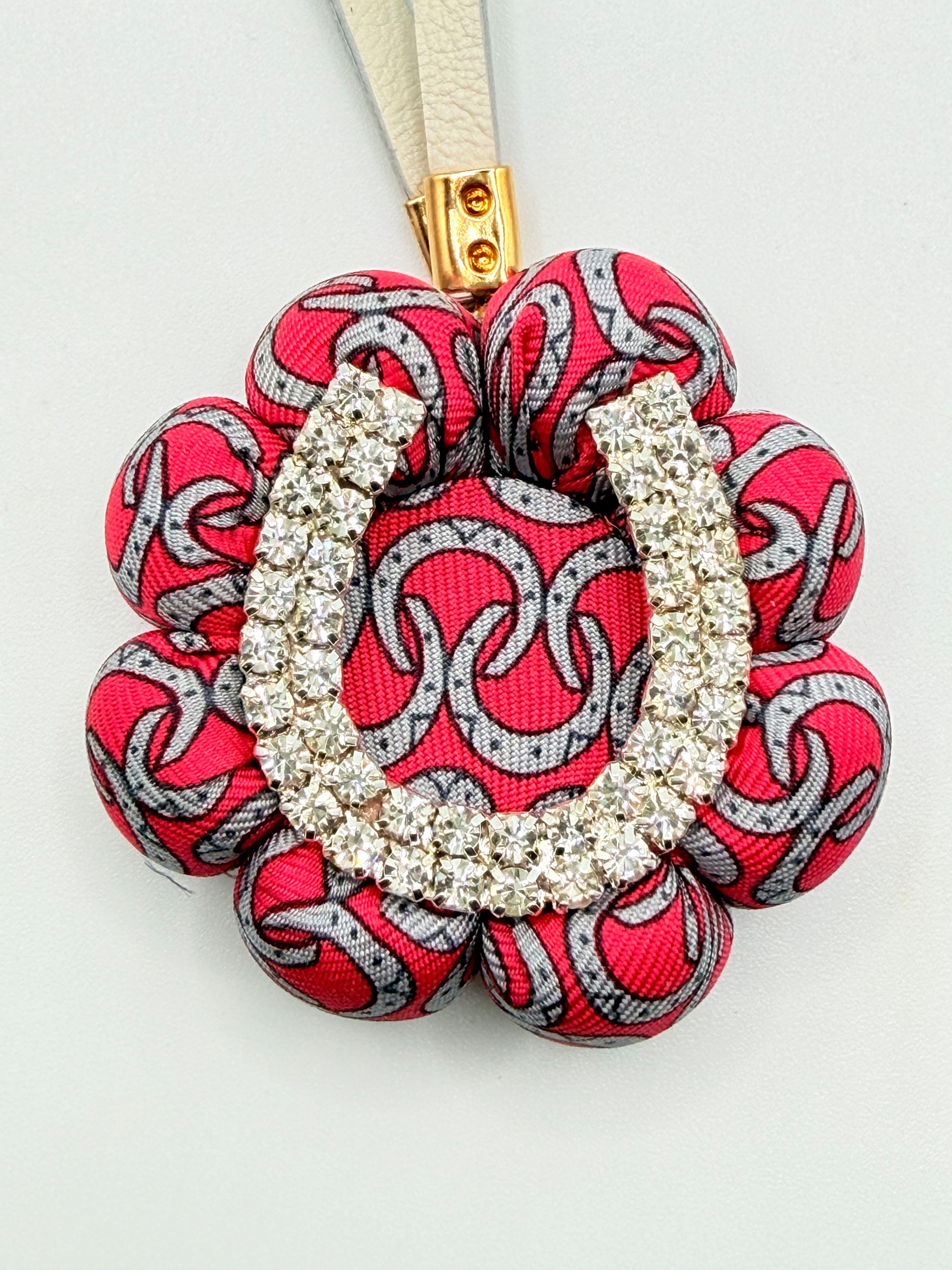 Red horse shoe bag charm made from a vintage Hermes silk tie