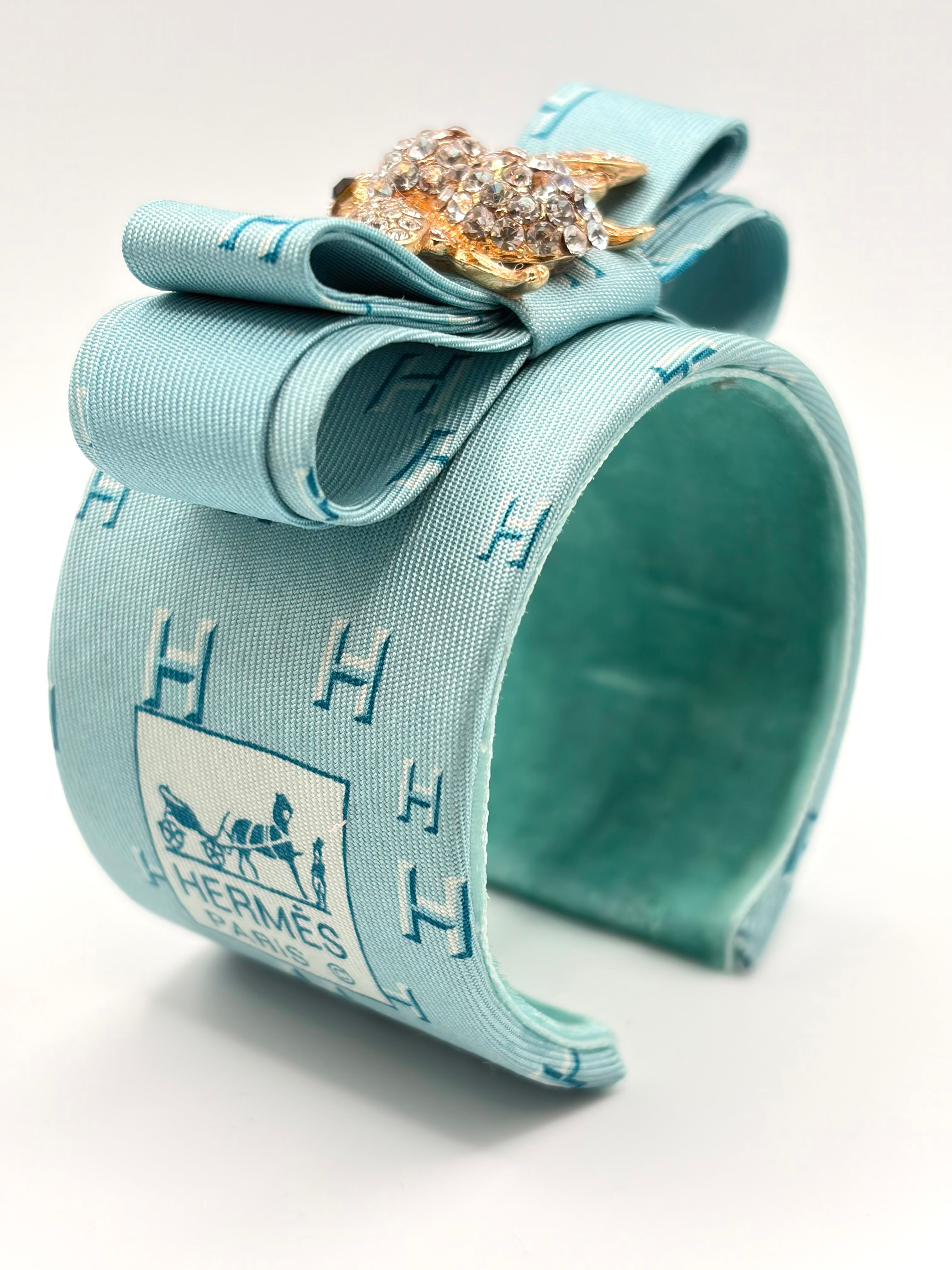 Aqua H print cuff with pearl bee made from a vintage Hermes silk tie