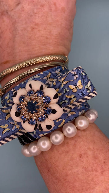 Thumbnail: Blue butterfly print cuff with polka dots made from a vintage Ferragamo silk tie