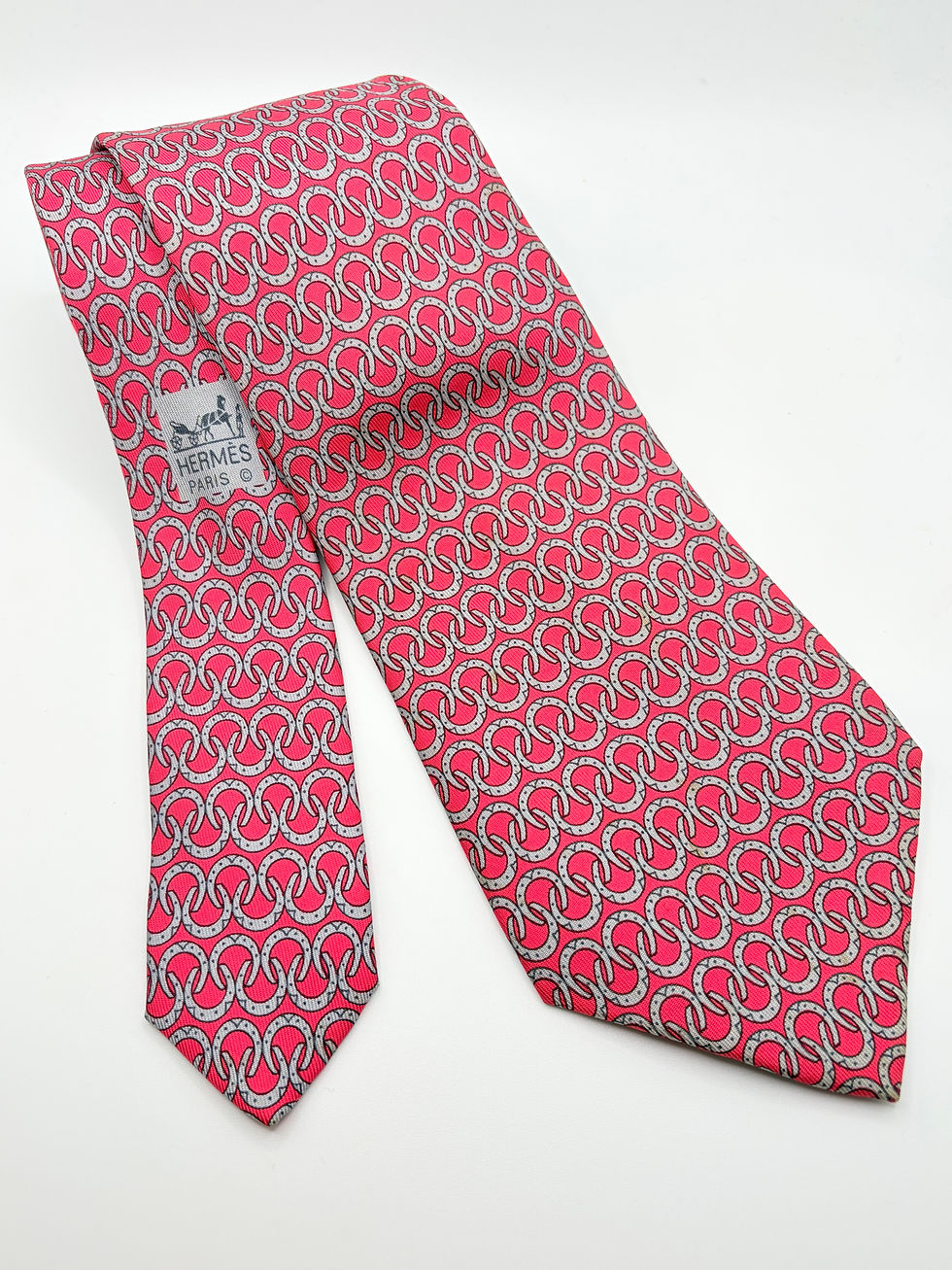 Thumbnail: Red horse shoe print cuff with horse shoe made from a vintage Hermes silk ties