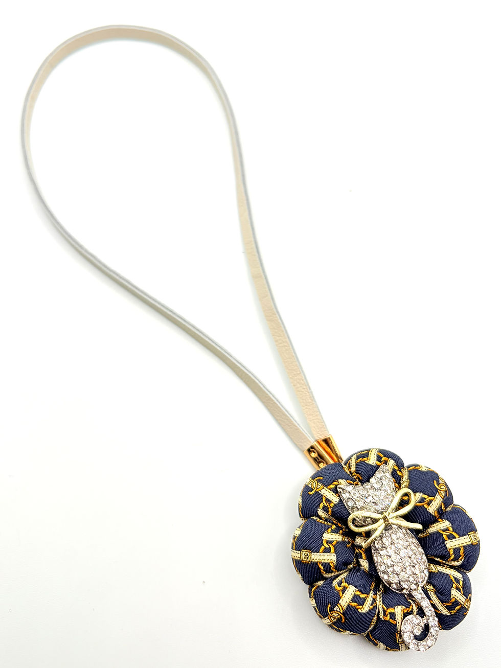 Thumbnail: Navy belt & chain design kitten bag charm made from a vintage Chanel silk tie