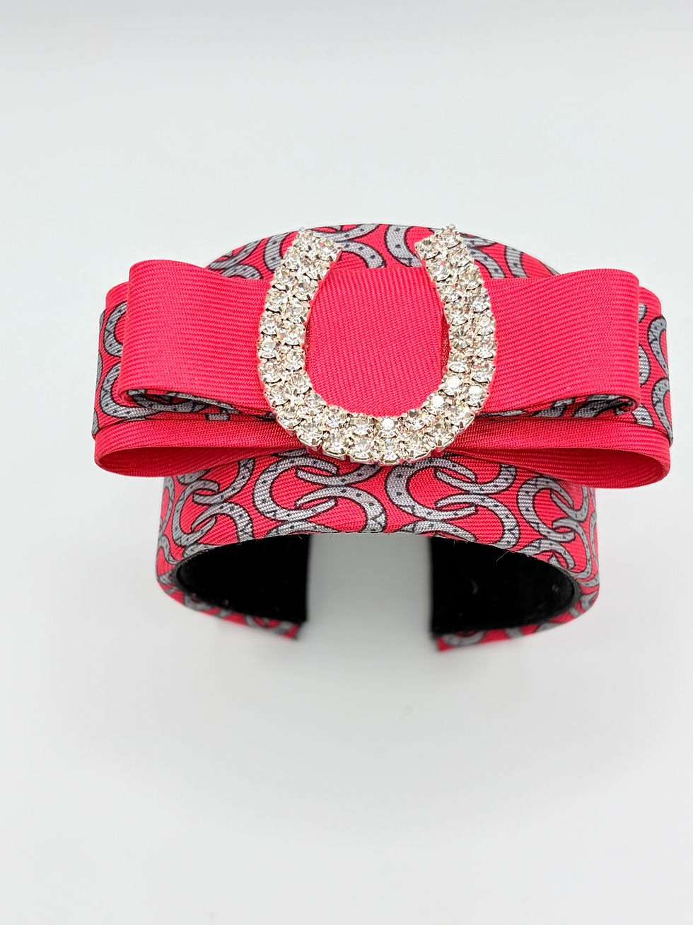 Thumbnail: Red horse shoe print cuff with horse shoe made from a vintage Hermes silk ties