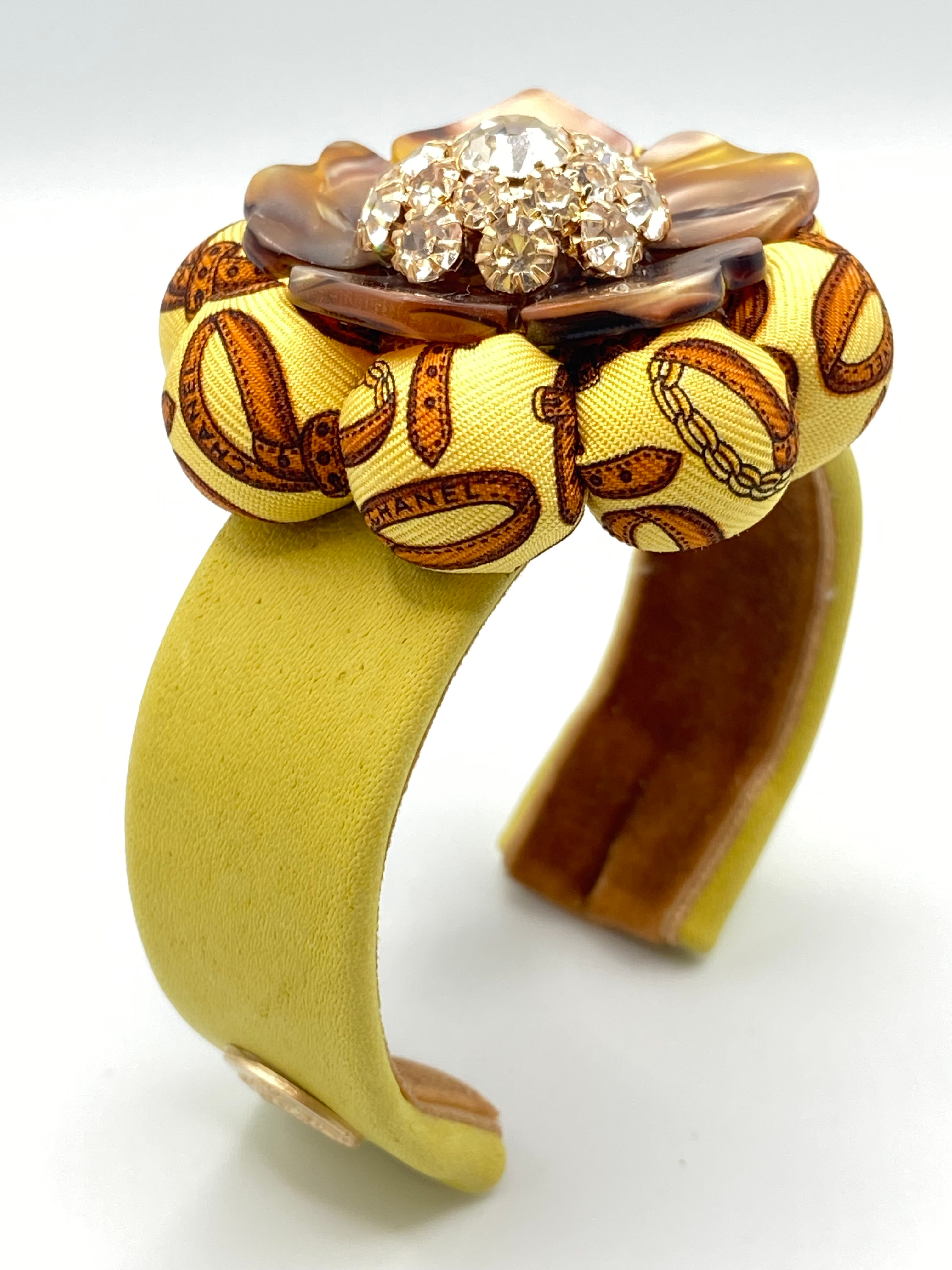 Yellow belt pattern rosette & leather cuff made from a vintage Chanel silk tie