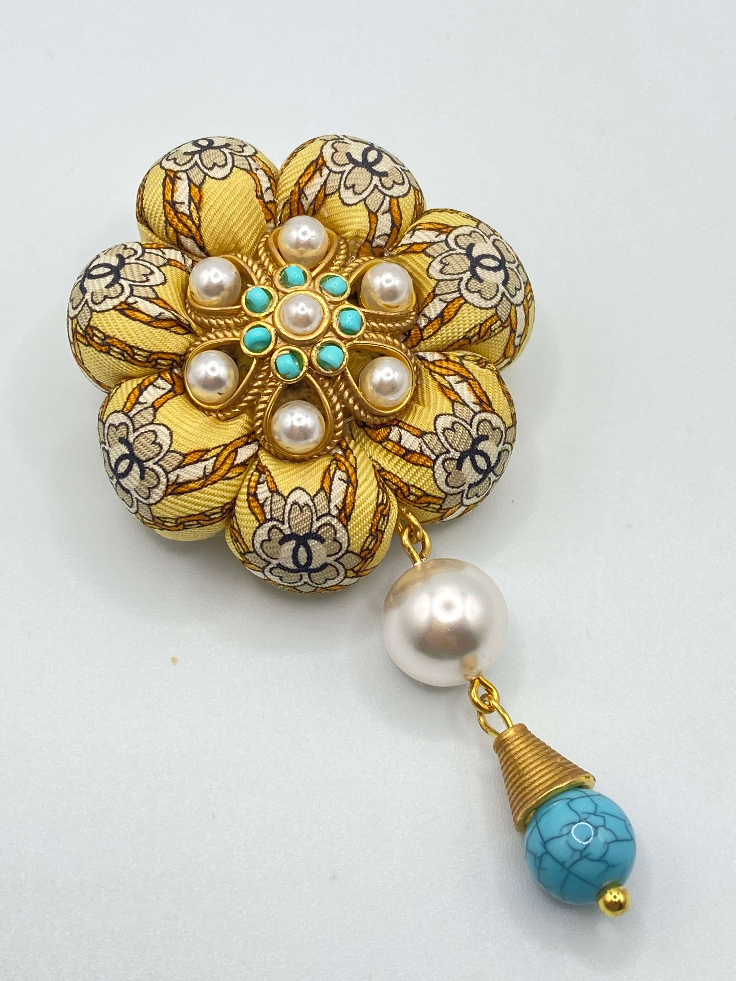 Yellow CC logo rosette brooch made from a vintage Chanel silk tie