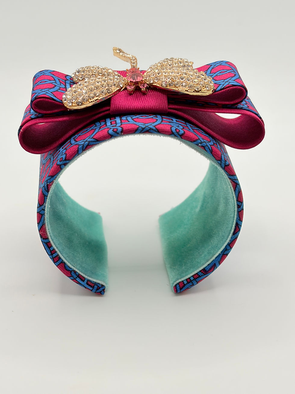 Thumbnail: Pink H print cuff made from a vintage Hermes silk tie