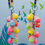 Thumbnail: Multicolour Huggie hoop glass and silk flower earrings