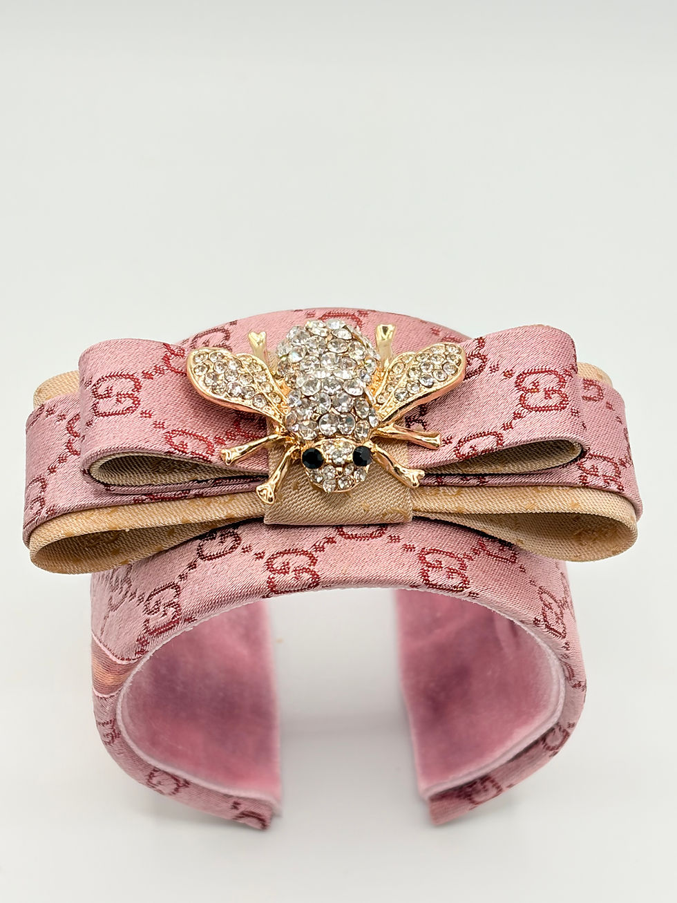 Thumbnail: Pink GG print bee cuff made from a vintage Gucci silk tie