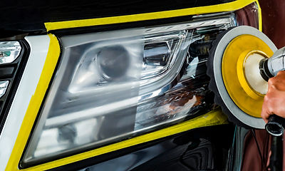 Big headlight cleaning with power buffer machine at service station ,Before and after clea