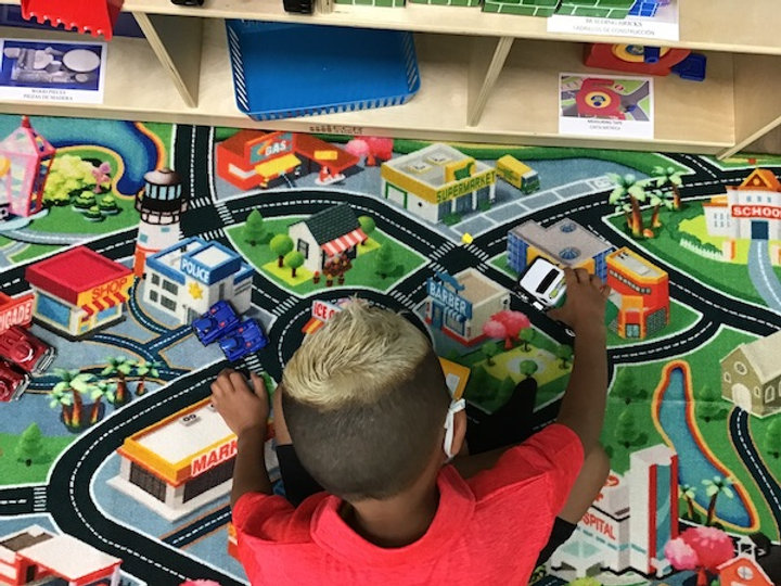 Chid_playing_with_toys.jpeg