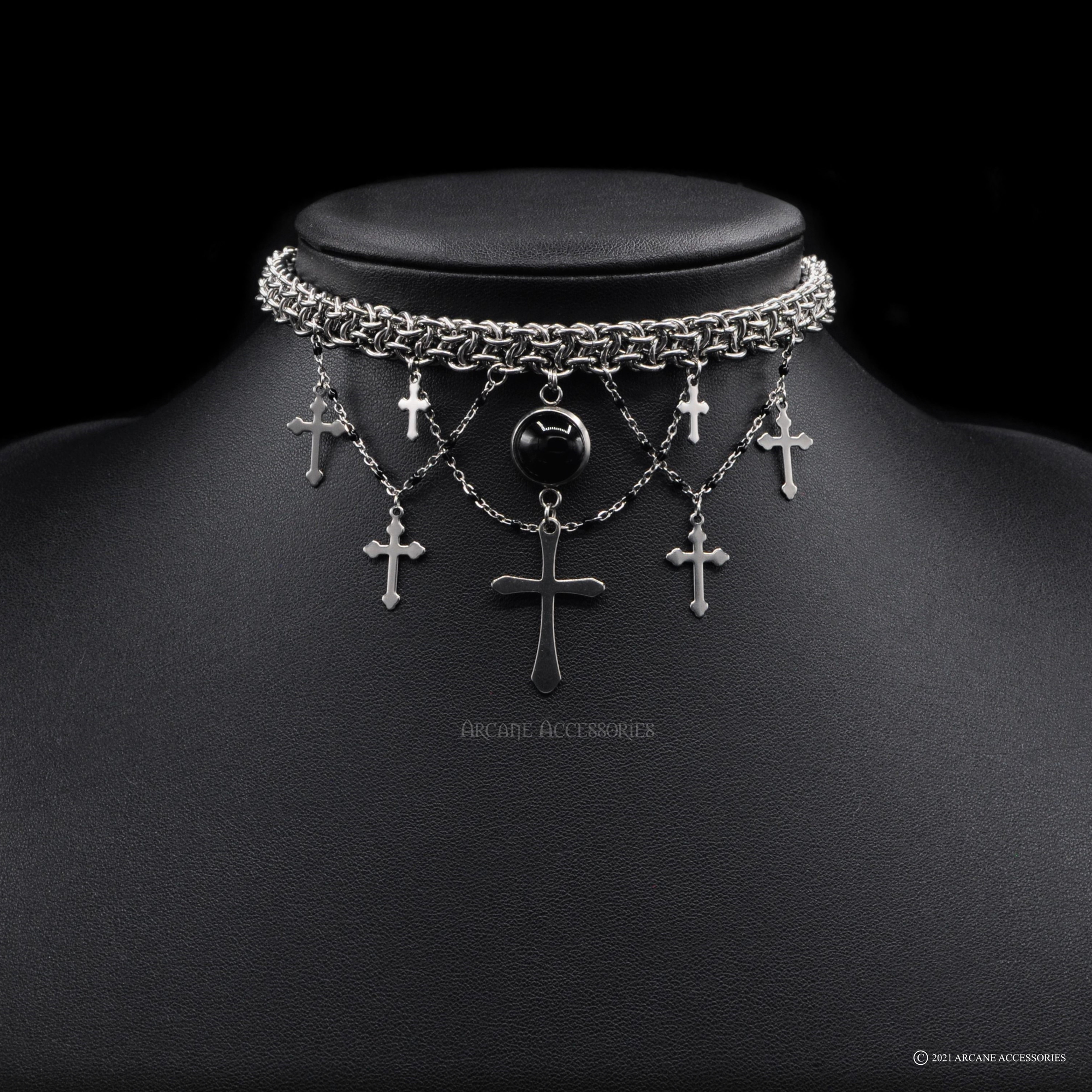 This exquisite choker features delicate black & silver beaded chain, adorned with an elegant onyx pendant and fine crosses