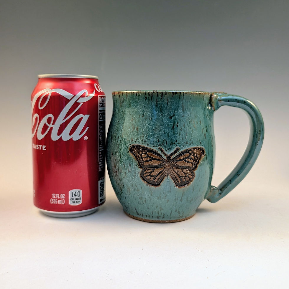 Thumbnail: Butterfly stoneware mug in light turquoise 