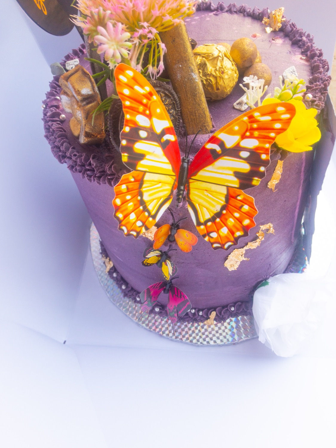 Purple hibiscus theme cake