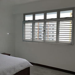 Window grill for cat installed in Singapore HDB bedroom, aluminium horizontal design with 2-inch gaps for safe and pet-friendly ventilation