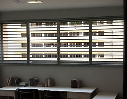 Cat proof window grille installed in Singapore HDB study area, aluminium horizontal bar design with 2-inch narrow gaps for pet safety and ventilation