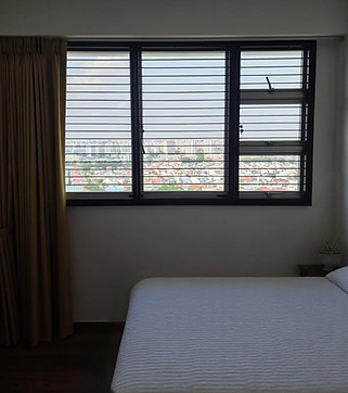 Casement cat proof window grill installed in Singapore HDB BTO bedroom, slim mild steel material with narrow 2-inch gaps for cat safety and ventilation