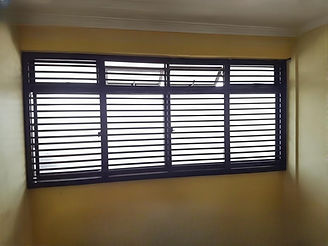 Cat proof window grill installation in Singapore HDB flat 2025, aluminium horizontal bar design with 2-inch gaps for pet safety and ventilation