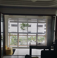 Cat proof window grill installed in Singapore HDB balcony, aluminium sliding grille with 2-inch narrow gaps to keep cats safe while allowing fresh air