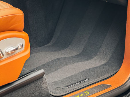 Deep cleaned car interior showing carpets after professional detailing in Dallas